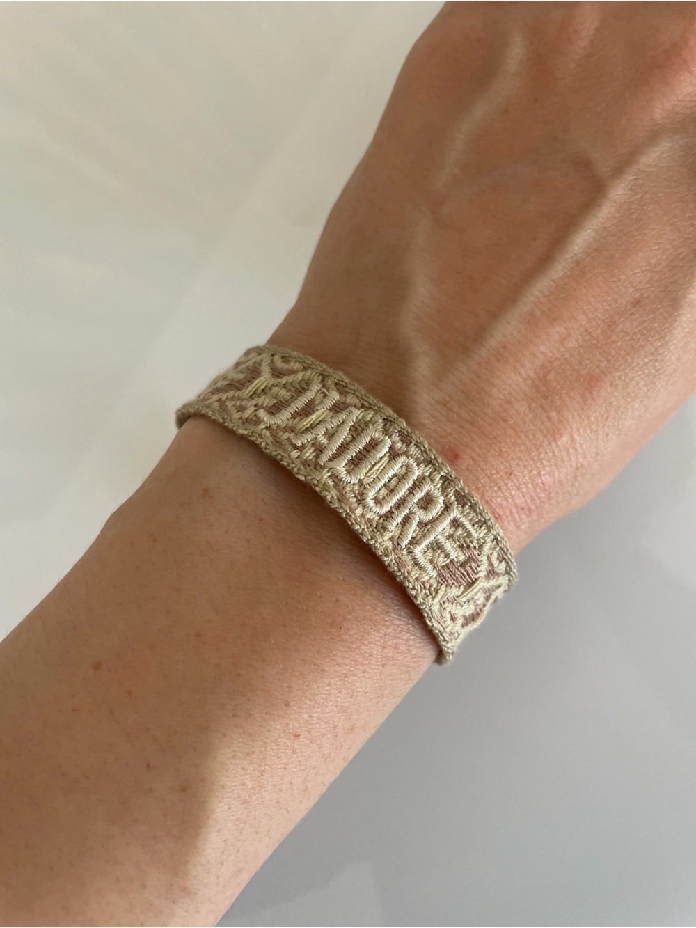 JADORE Woven Beige Bracelet tassels logo